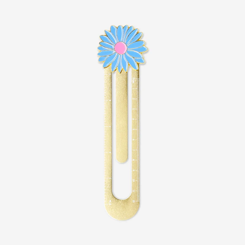 Gold metal ruler with flower