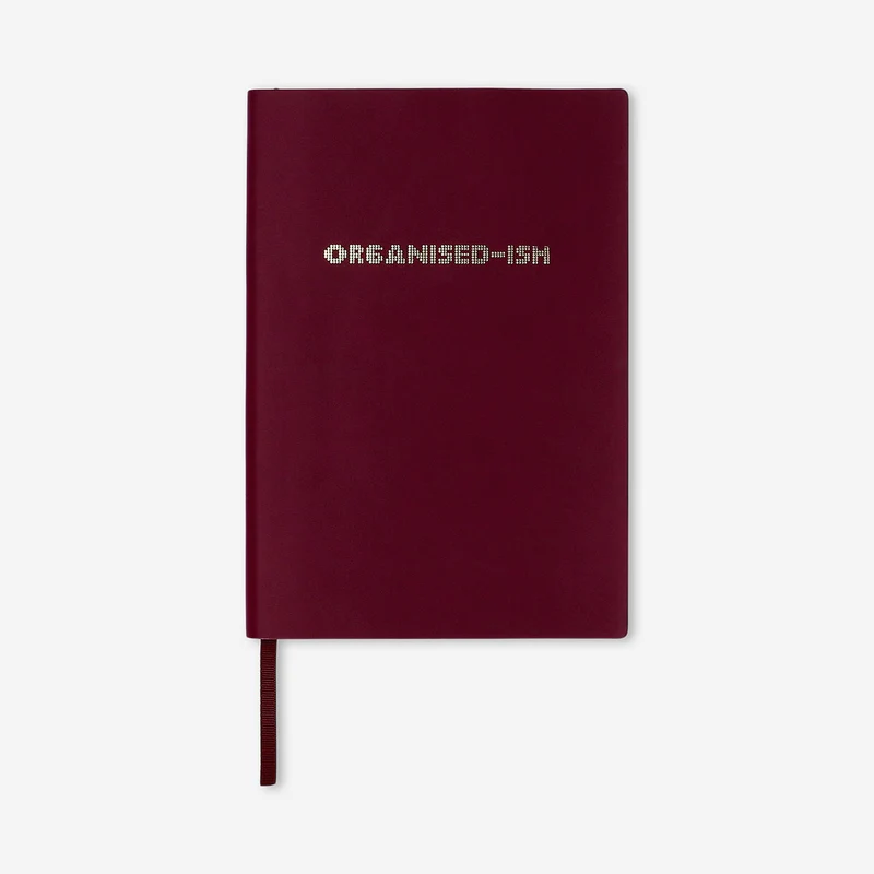 Burgundy notebook with text