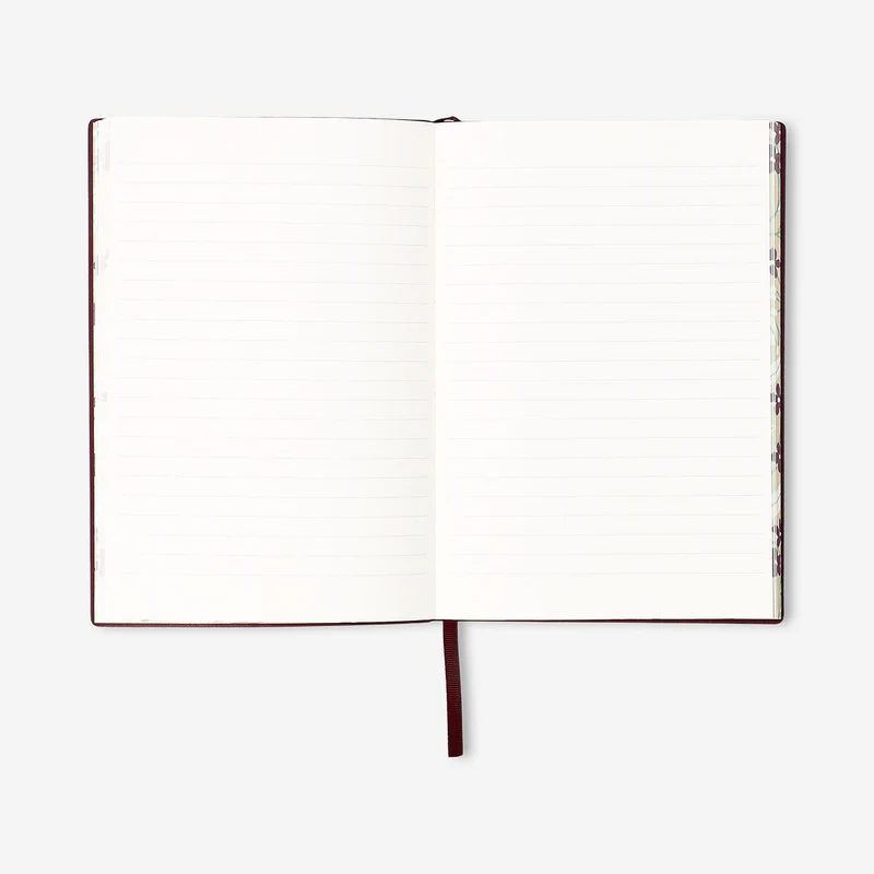 Burgundy notebook with text