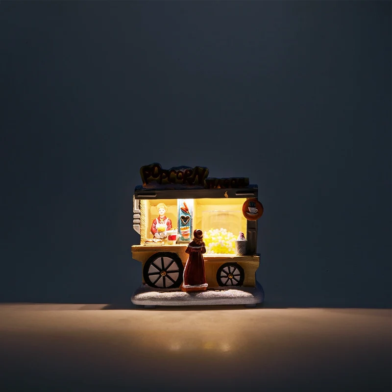 Scene for Christmas village. With light, movement and music