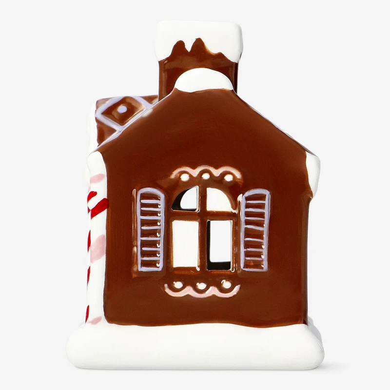 Glowing ceramic gingerbread house