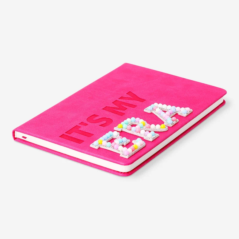 A5 pink notebook with pom poms