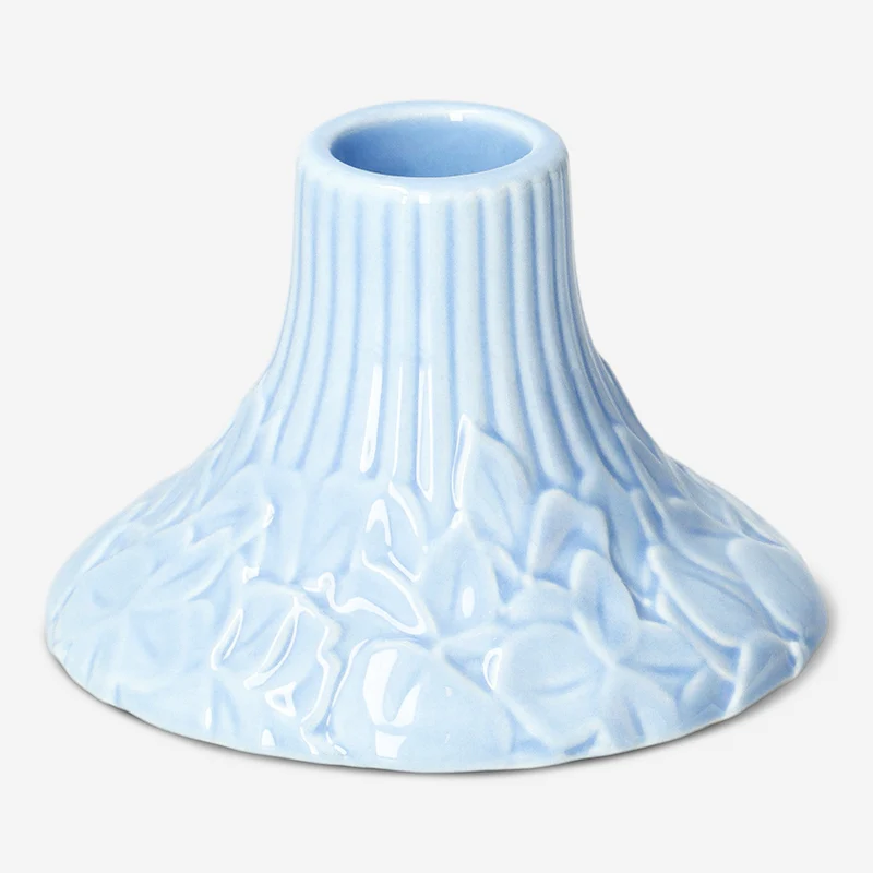 Blue candleholder with embossed hydrangeas