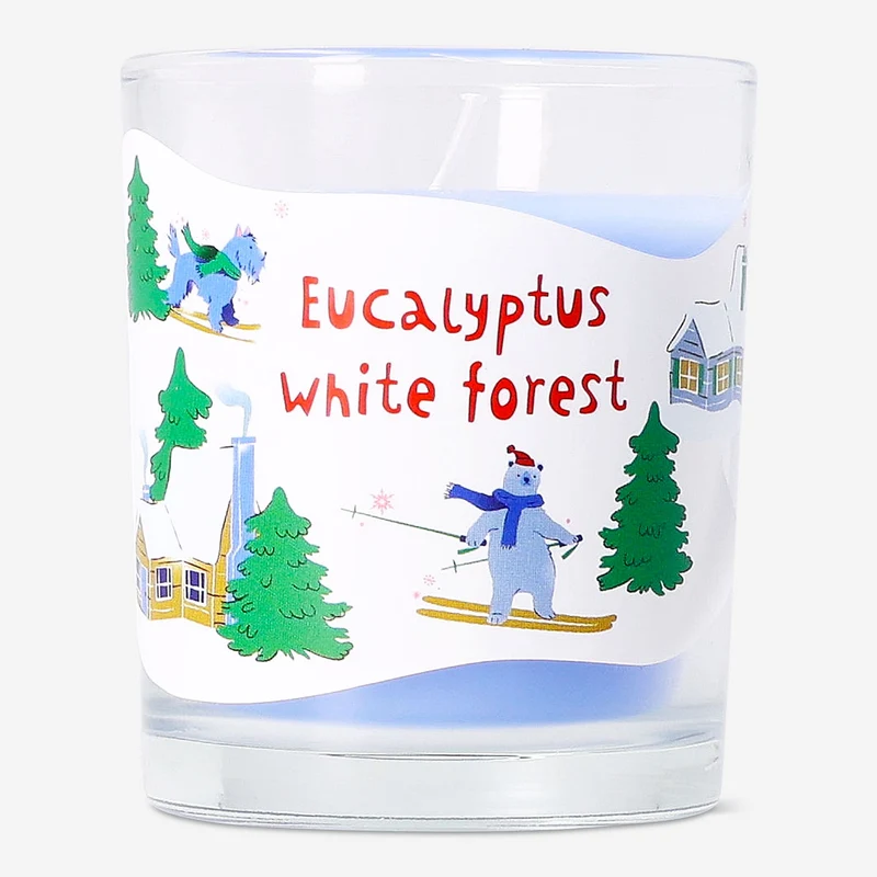 Scented candle with eucalyptus and white forest fragrance