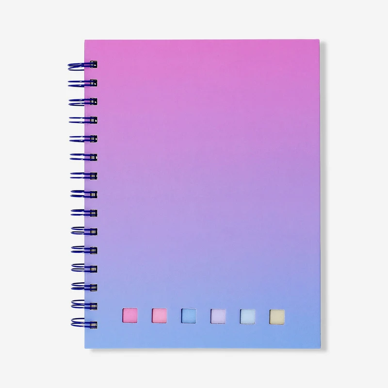 Gradient notebook with ballpoint pen and page markers