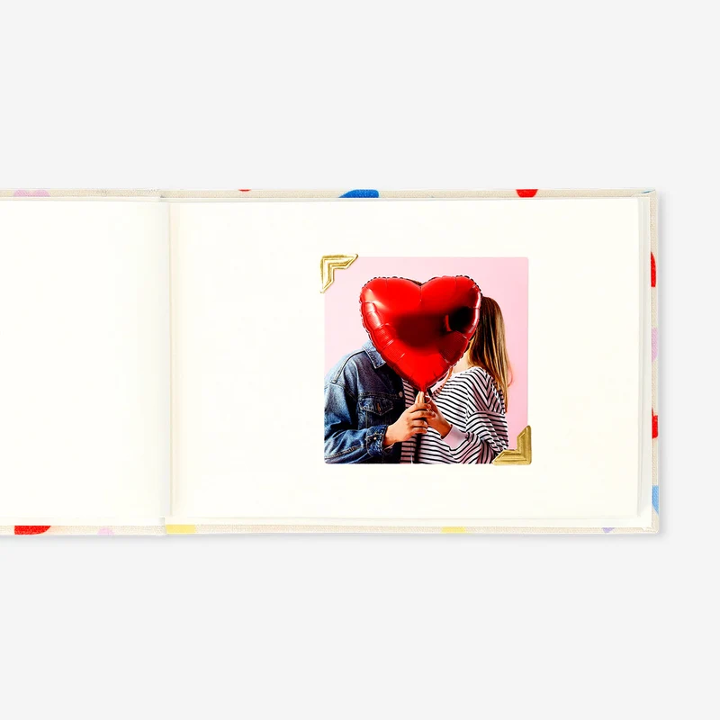 Photo album with 24 adhesive photo corners