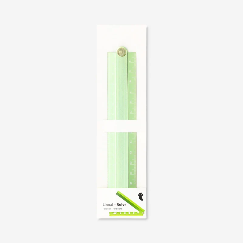 Green foldable ruler with stencils