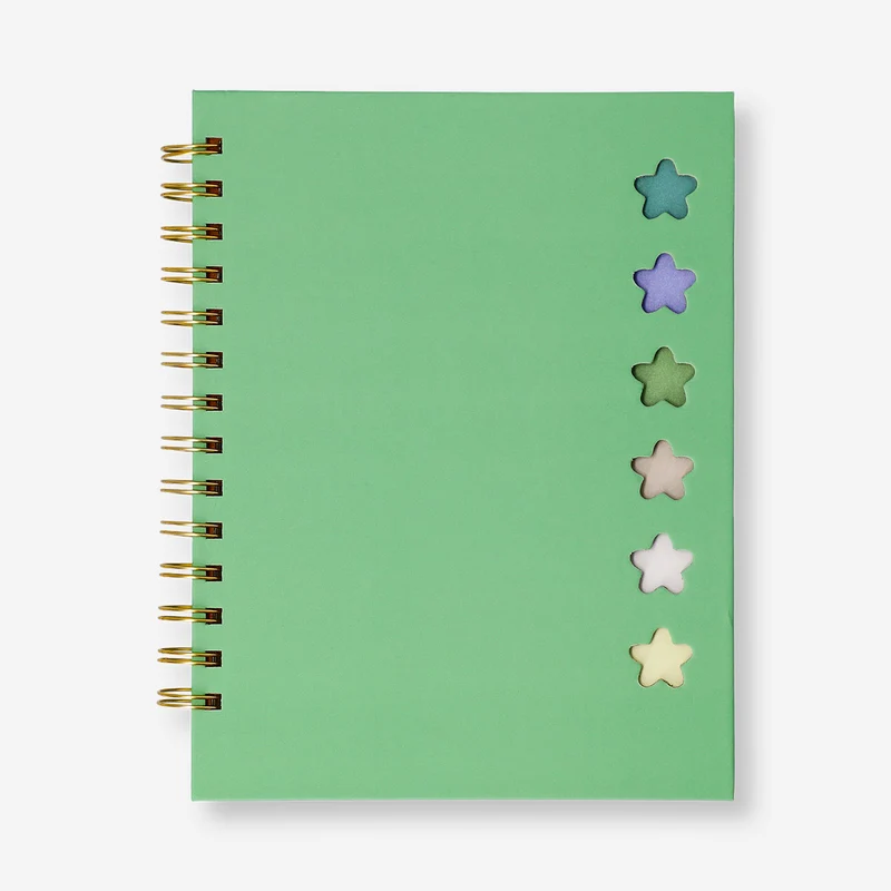 Green notebook with ballpoint pen and memos