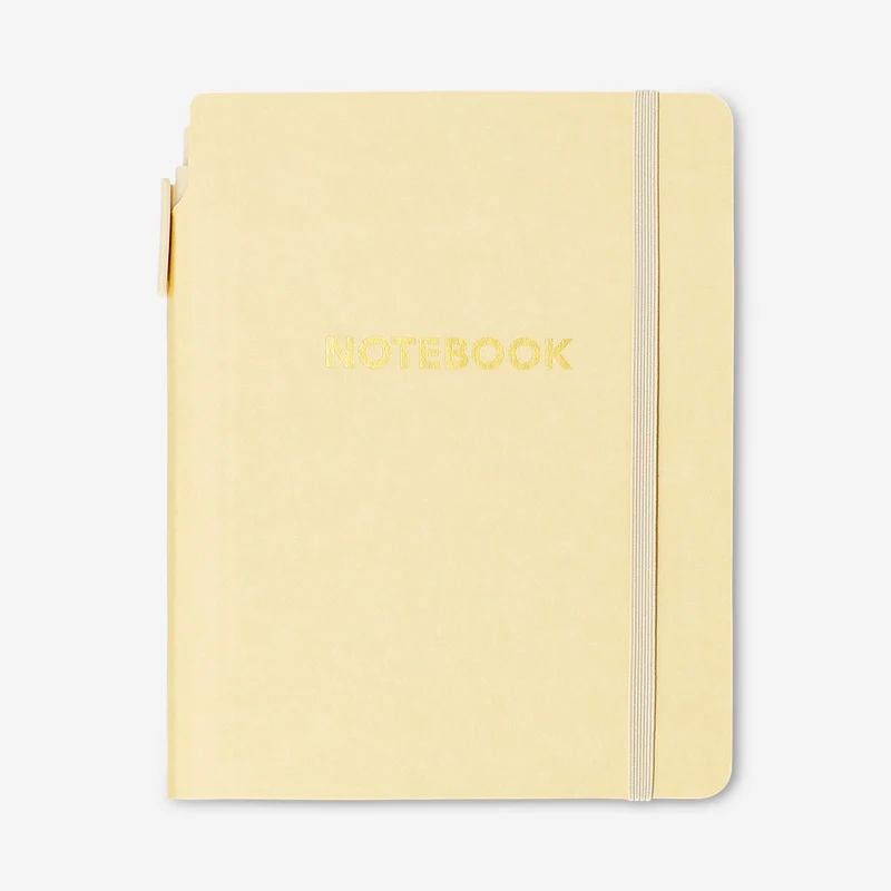 Butter yellow notebook with ballpoint pen