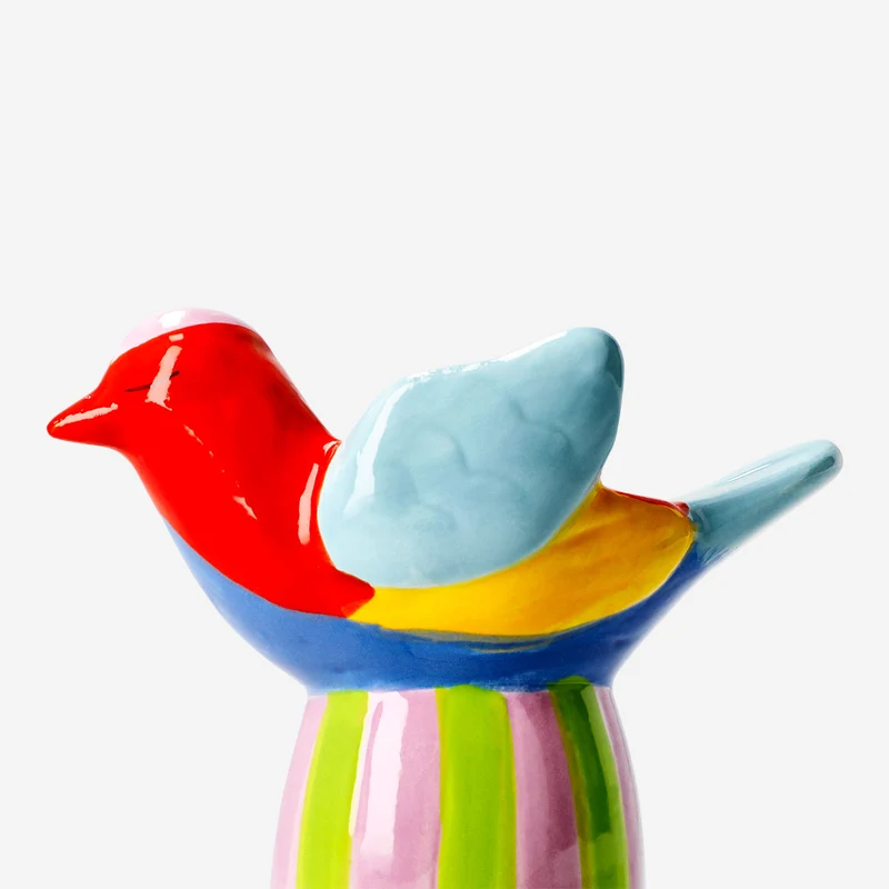 Ceramic bird tealight holder with striped base