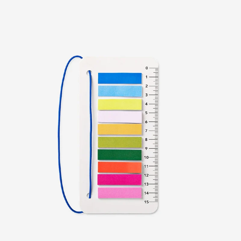 Ruler with elastic and page markers