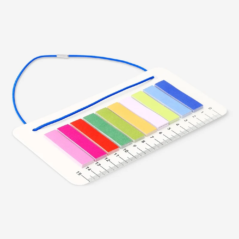 Ruler with elastic and page markers