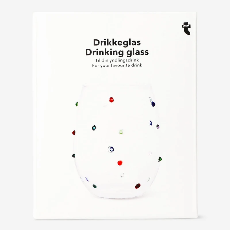 Drinking glass with multi coloured dots