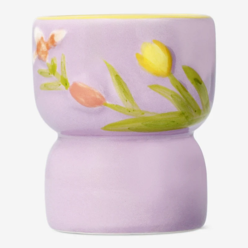 Tealight holder with embossed flowers