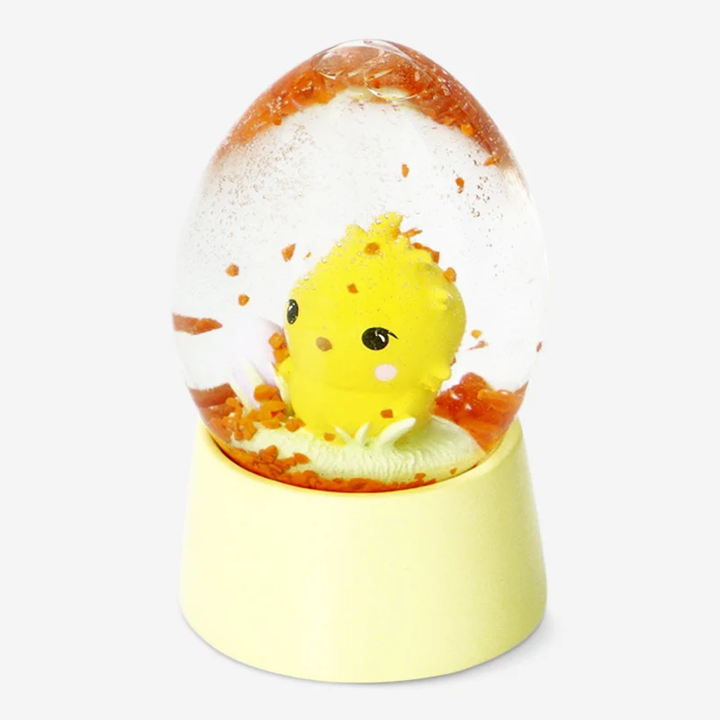 Snow globe with Easter chicken