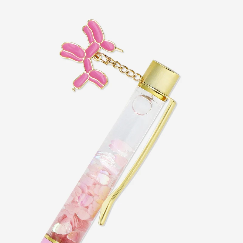 Pink ballpoint pen with balloon dog