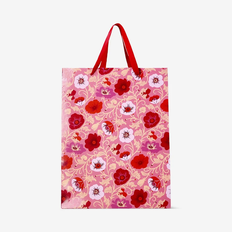 Floral gift bag with ribbon handle