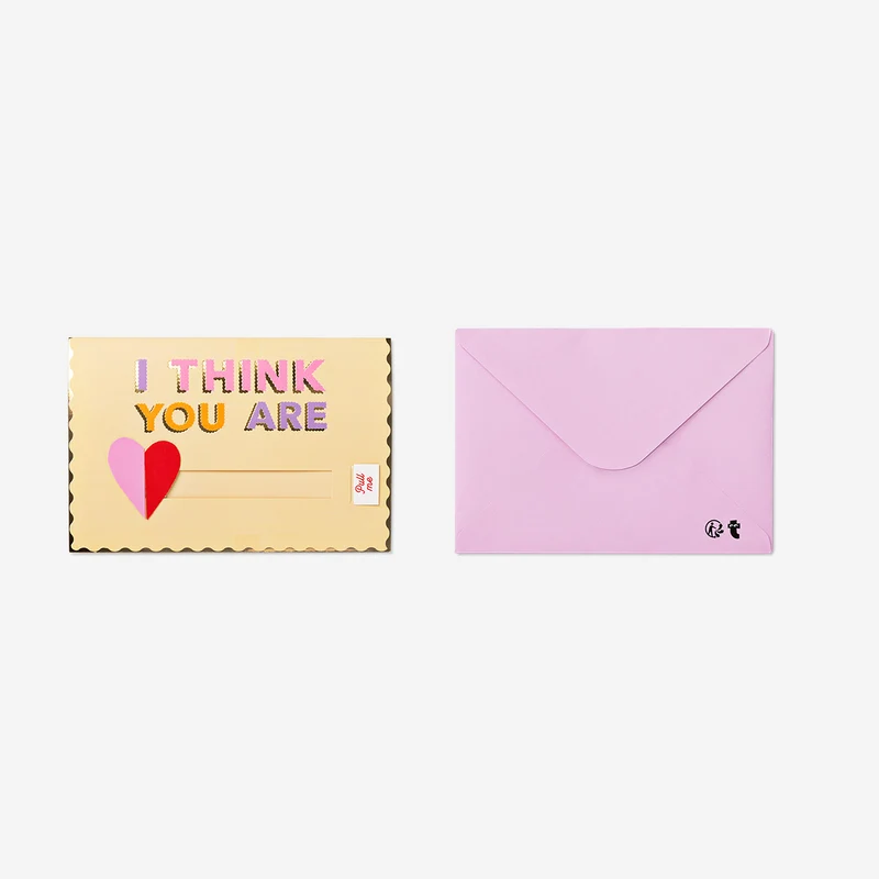 Greetings card with pull mechanism
