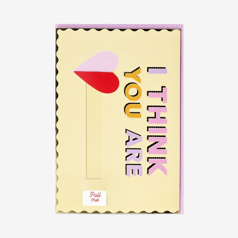 Greetings card with pull mechanism