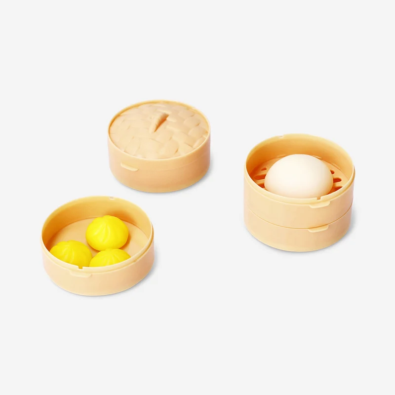 Candy dumplings in steamer basket