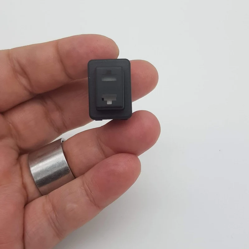 Pulsante push unipolare 20x13 nero 2 contatti con asole De Longhi