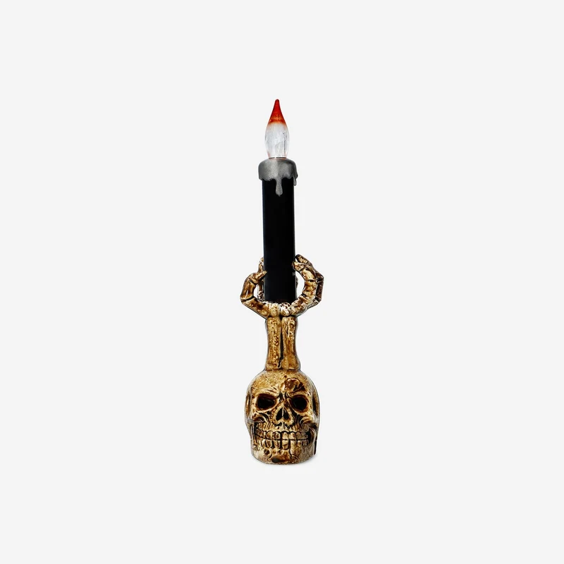 Colour changing skull candle holder