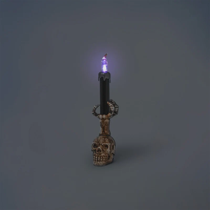 Colour changing skull candle holder