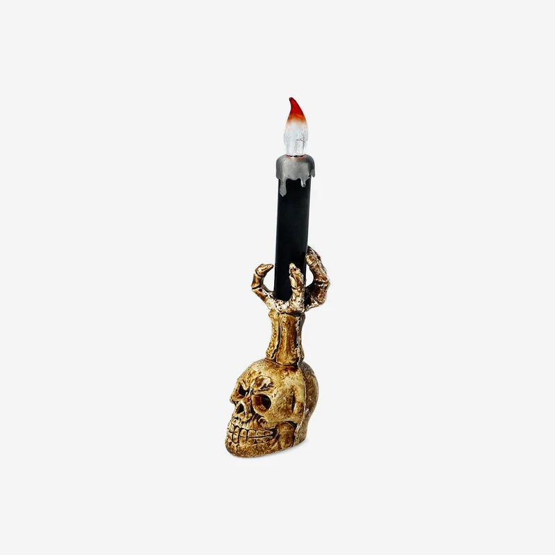 Colour changing skull candle holder