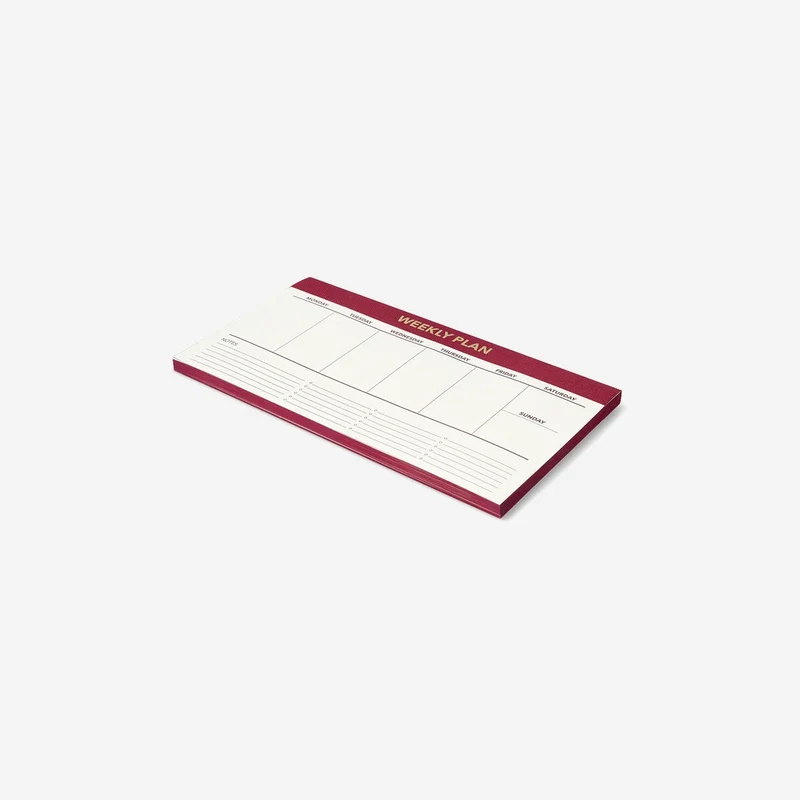 Red weekly planner for desk