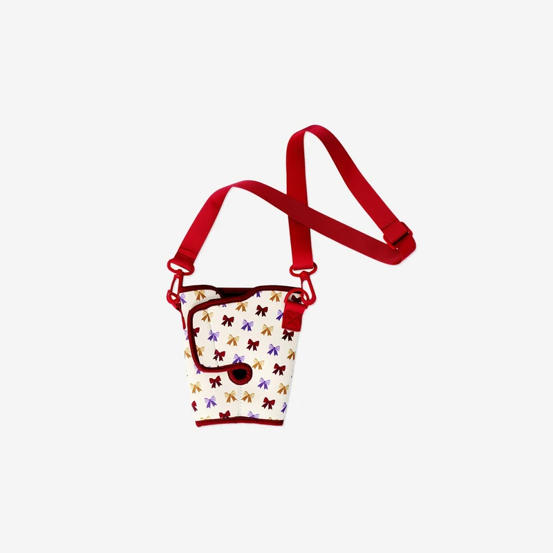 Cup holder for tumbler with bow print