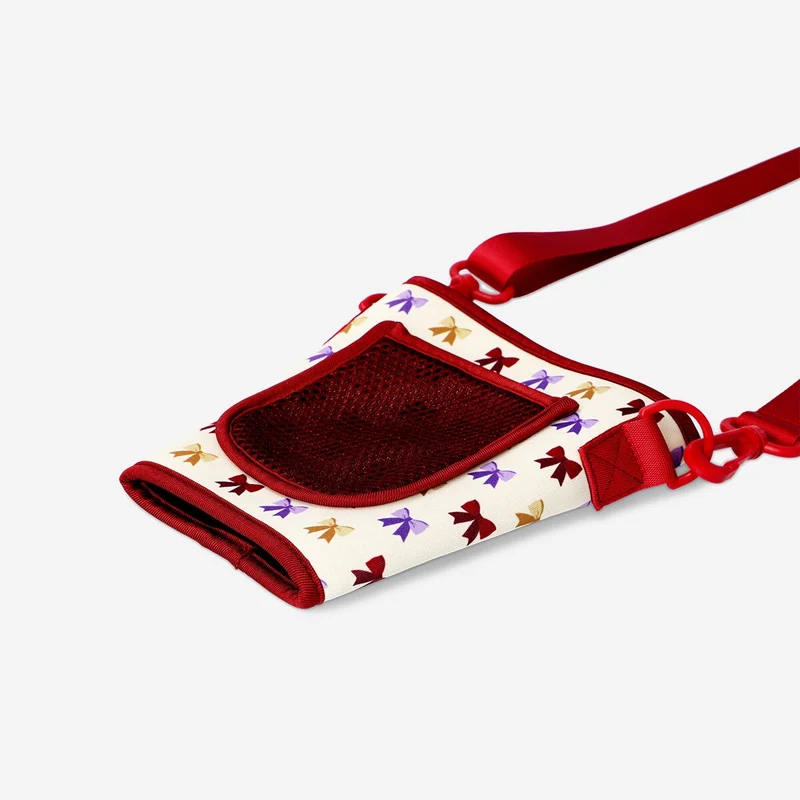 Cup holder for tumbler with bow print