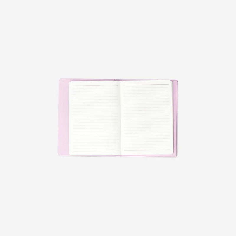 Pink notebook with cup