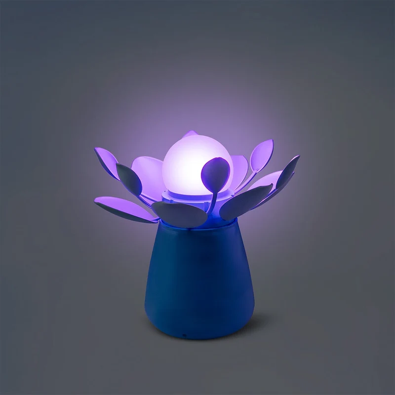 Glowing blue flower lamp that moves