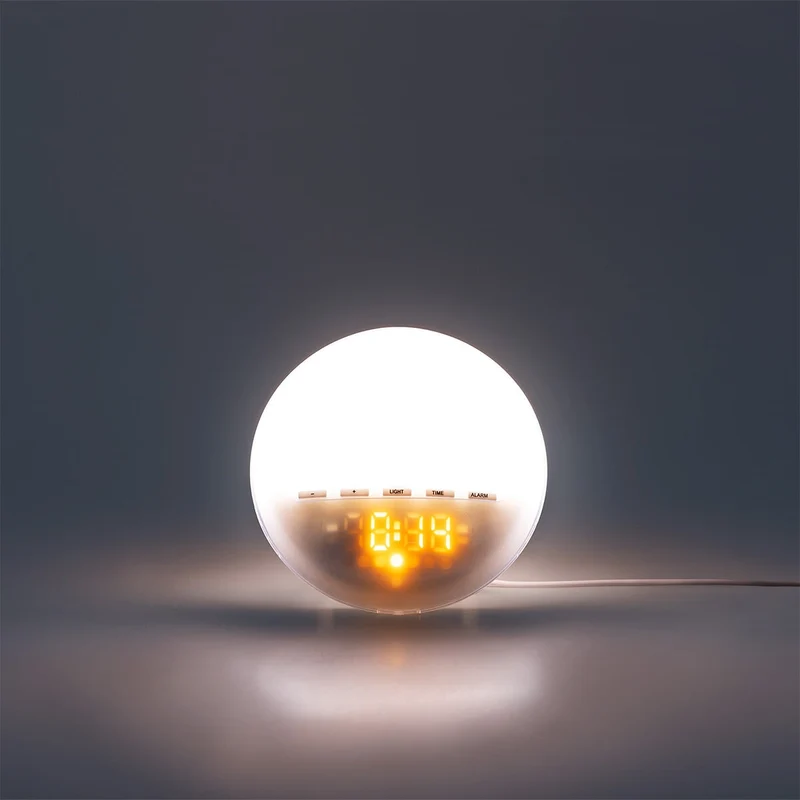 Digital alarm clock with sunrise light