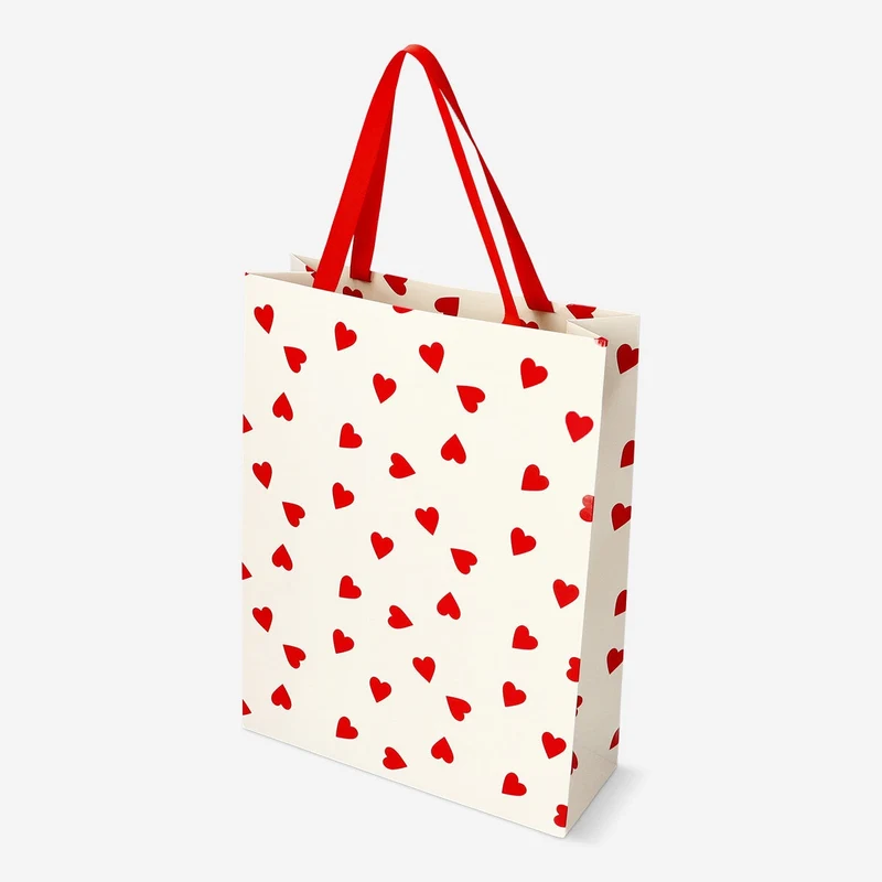 Gift bag with red hearts and handle