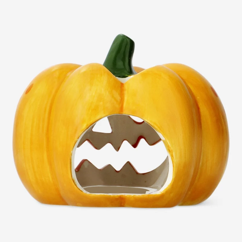 Pumpkin shaped candle holder