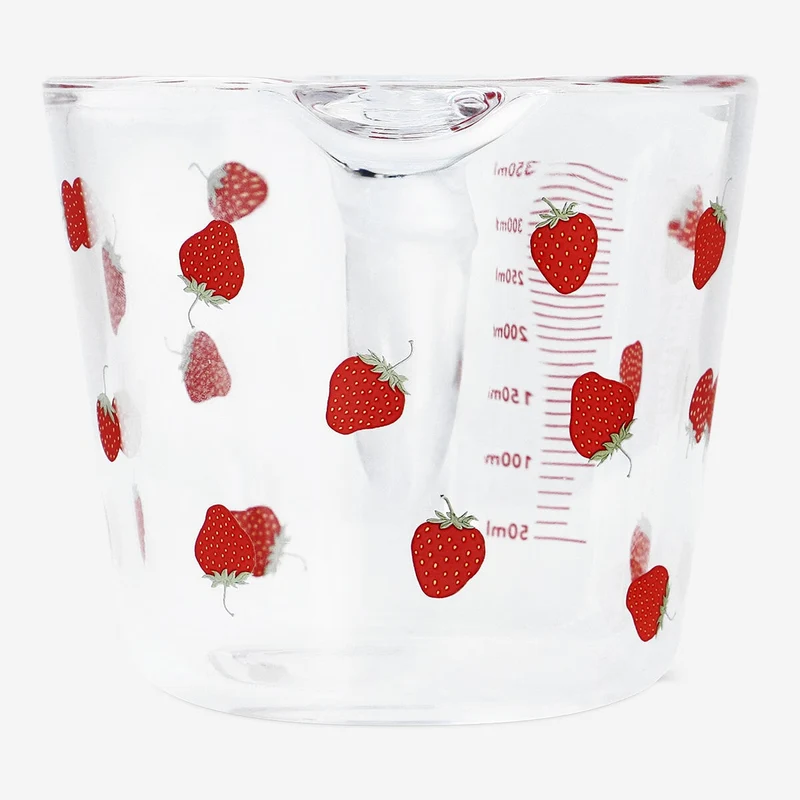 Measuring cup with strawberry print