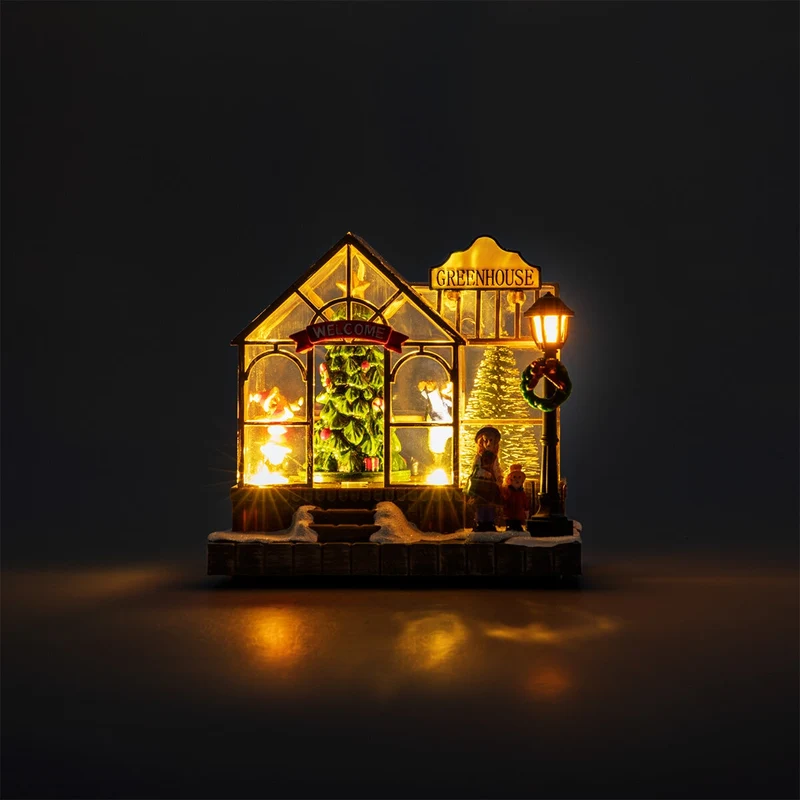 Scene for Christmas village. With light, movement and music