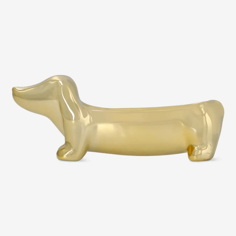 Gold sausage dog jewellery holder