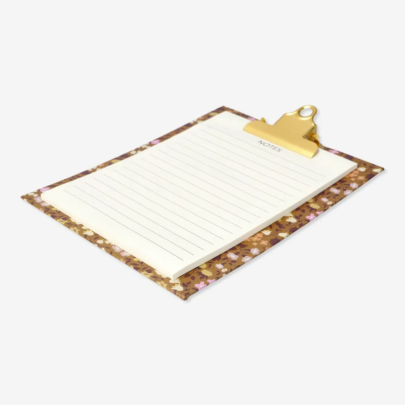 Clipboard with paper pad