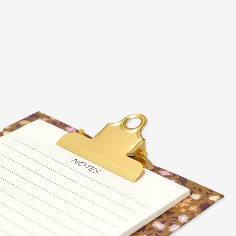 Clipboard with paper pad