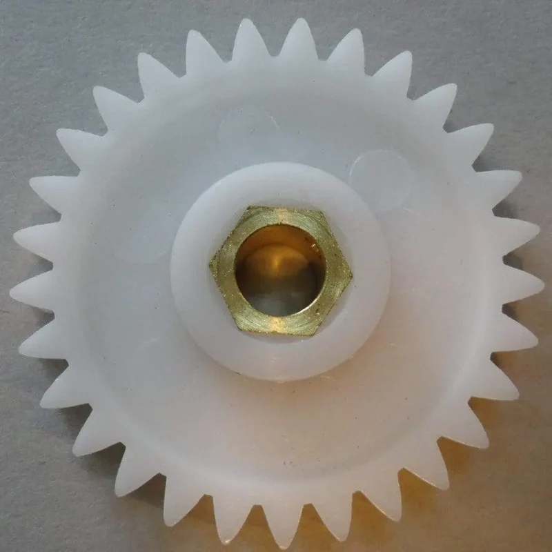 Ingranaggio ruota dentata plastica forata per gruppetto grattugia tricarne Quick Mill